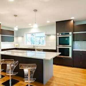 three clear glass bar stools
